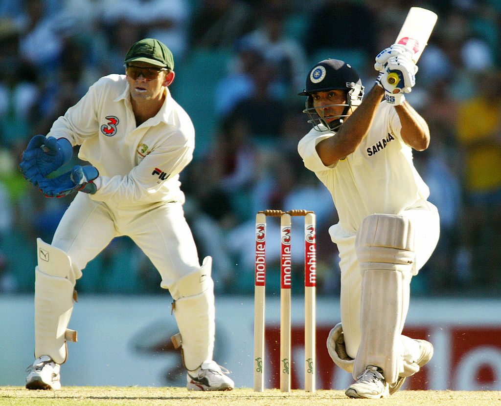 Indian batsman VVS Laxman (L) drives as